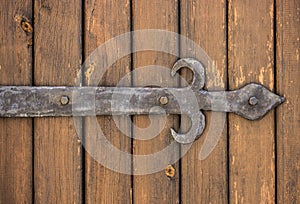 Dark wooden texture with forged metal elements