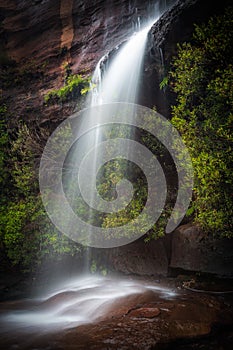 Light catching the waterfall in Darkes Forest photo