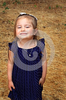 Darling Little Girl in Polka Dot dress