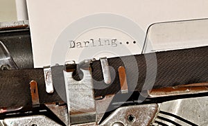 Darling word typed on old black typwriter