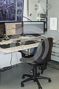 Computerised electronic control workstation inside a factory of prcoduction line control