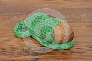 Darning egg with hand-knitted sock