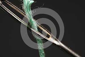 Darning needle with wool thread