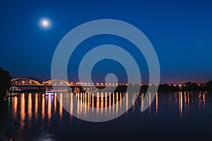 Darnitskiy bridge across Dnepr river at night. Kiev, Ukraine