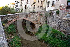 Darro carrera street river and arch Granada