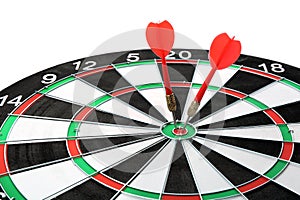 Dart board with color arrows hitting target