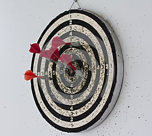 Dart board with hanging on the wall