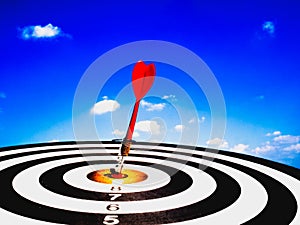 Dart Board Isolated on blue sky and clouds background, Setting challenging business goals And ready to achieve the goal concept