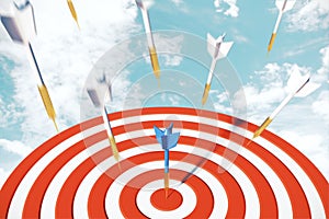 Dart board target with arrows