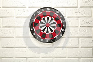 Dart Board on the white wall background