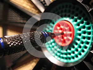 Dart in the center of the dartboard photo