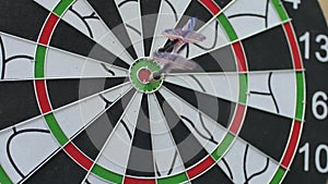 Dart hitting bull`s eye, bulls-eye three shots . Concept of successful business ideas hitting the exact center of the