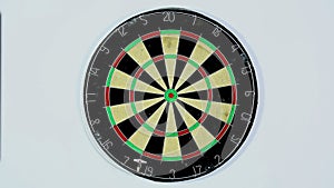 Dart strikes the bulls-eye of a dartboard