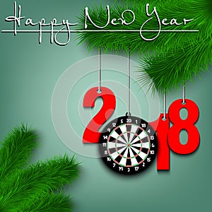 Darts boardl and 2018 on a Christmas tree branch