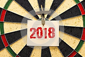 Darts with dart which was pinned a sheet of paper for labels 2018 photo