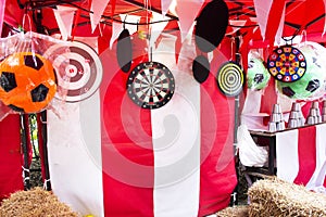 Darts throwing or throwers arrows in dartboard local carnival funfair festival for thai people and foreign travelers travel visit photo