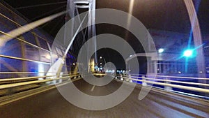 Dash cam on car driving on a bridge