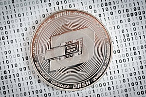 Dash coin on binary background