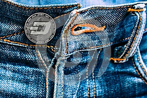 Dash coin instead of buttons on jeans.