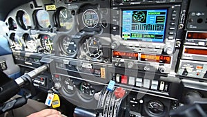 Dashboard in the aircraft, pilot`s steering wheel in the cockpit