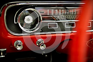 Dashboard of classic red retro car
