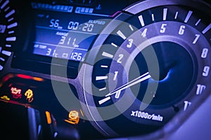 Dashboard of the motorcycle and Engine gauge , selective focus