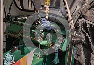 Dashboard and steering wheel and shift lever inside Thai traditional taxi or Three wheels vehicle  3-wheeler taxi. Tuk-Tuk car