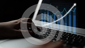 Data Analysis and Financial Growth Visualization on Laptop with Graphs and Charts Illuminating Business Progress and