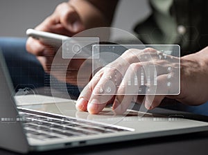 data analysis. On a futuristic virtual interface screen, a man programmer studies and creates software using a digital tablet