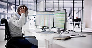 Data Analyst African Man Using Spreadsheet