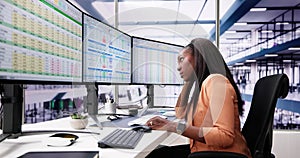 Data Analyst African Woman Using Spreadsheet photo