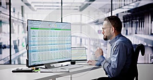 Data Analyst Man Using Spreadsheet