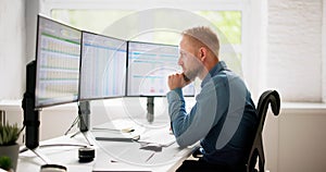 Data Analyst Man Using Spreadsheet photo