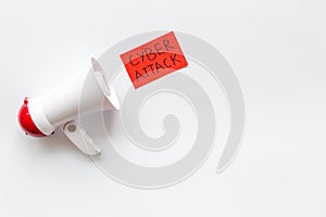 Data breach concept with megaphone on white background top view mock up