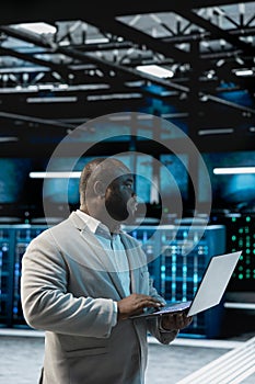 Data center admin running system diagnostic tests, automating anomaly detection