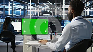 Data center admin using AI node tree software on isolated screen PC
