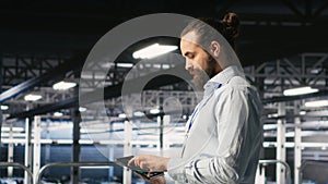 Data center computer scientists using devices to review AI LLM visualizations