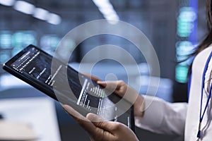 Data center developer uses computer to troubleshoot hardware and software errors
