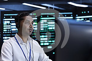 Data center developer uses computer to troubleshoot hardware and software errors