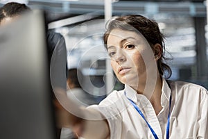 Data center engineer inspecting equipment, doing maintenance tasks