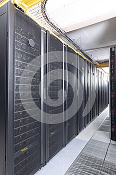 Data center with multiple rows of fully operational server racks