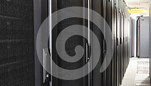 Data center with multiple rows of fully operational server racks