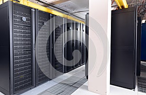 Data center with multiple rows of fully operational server racks