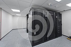 Data Center With Multiple Rows of Fully Operational Server Racks. Modern Telecommunications, Cloud Computing, Artificial