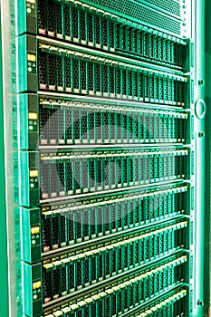 Data Center With Multiple Rows of Fully Operational Server Racks in server room. Cloud database, super Computer