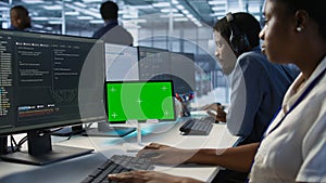 Data center programmer using mockup tablet, maintaining company network