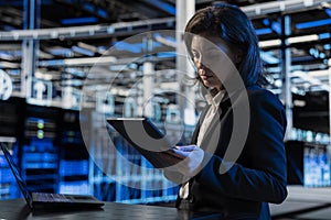 Data center programmer using tablet to install and configure equipment