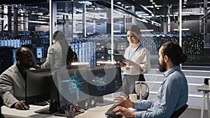 Data center team of technicians working on neural network software development