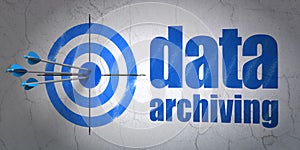 Data concept: target and Data Archiving on wall background