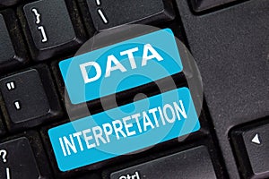 Data Interpretation on keyboard isolated on laptop background photo